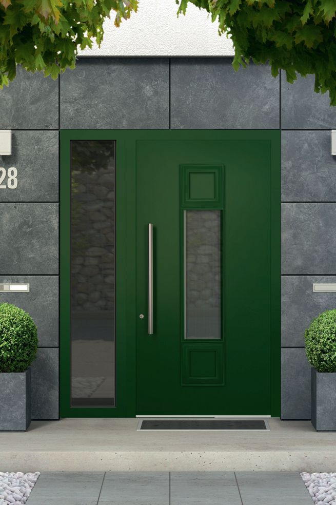 Drzwi zewnętrzne mogą mieć różny kolor - na zdjęciu zielone drzwi zewnętrzne