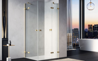 ANNEA - eleganckie kabiny bezramowe w szczotkowanym złocie