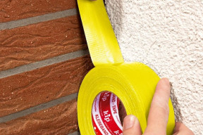 Która taśma naprawdę trzyma na betonie? Poznaj żółtą taśmę tkaninową do muru