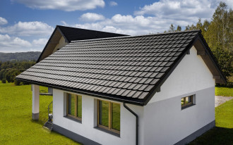 Dlaczego design dachówki ma kluczowe znaczenie w kontekście architektury współczesnego domu?