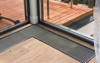 Jakie są zalety i wady grzejników kanałowych? Jak je dobrać do domu?