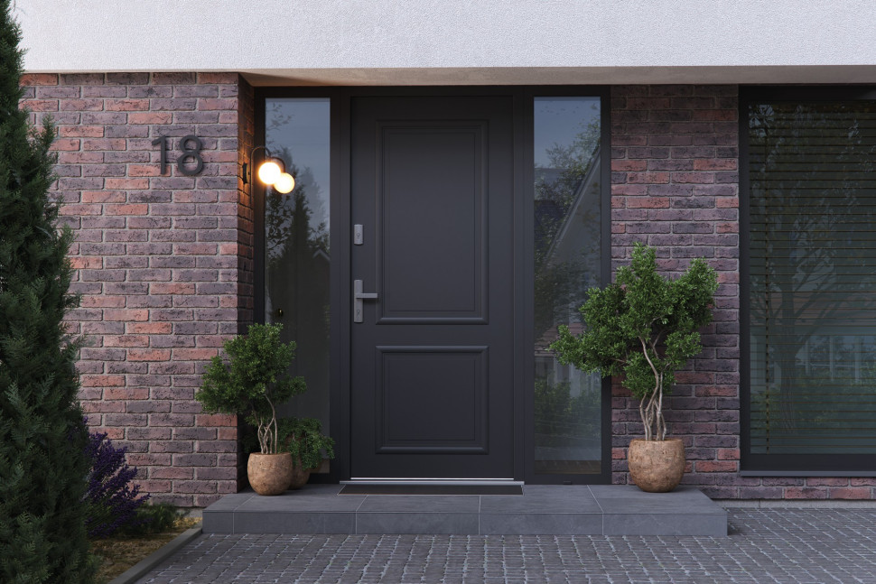 Drzwi zewnętrzne PortaTHERMO C.2 220 cm w kolorze czarnym, wyposażone w stylową srebrną klamkę Apollo. 