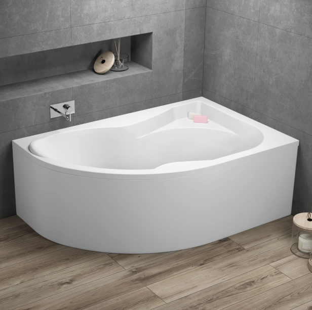 Wanna narożna asymetryczna DORA z gładkimi, miłymi w dotyku ściankami, które są specjalnie wyprofilowane, by zapewnić komfortowe ułożenie ciała w czasie kąpieli