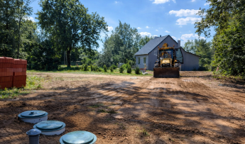 Szybkozłącze do szamba w ogrodzeniu – montaż krok po kroku (PVC Ø110)