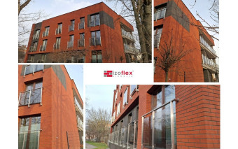 Czerwień i czerń na elewacji. Zastosowanie elastycznych płytek Izoflex Toledo oraz Grenada