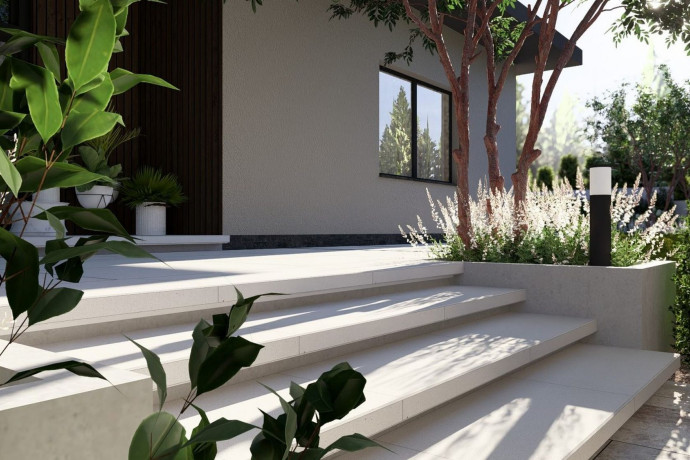 Semmelrock na wiosnę - nawierzchnie, palisady i donice Livello Grande, Ventura i taupe wokól domu i do ogrodu