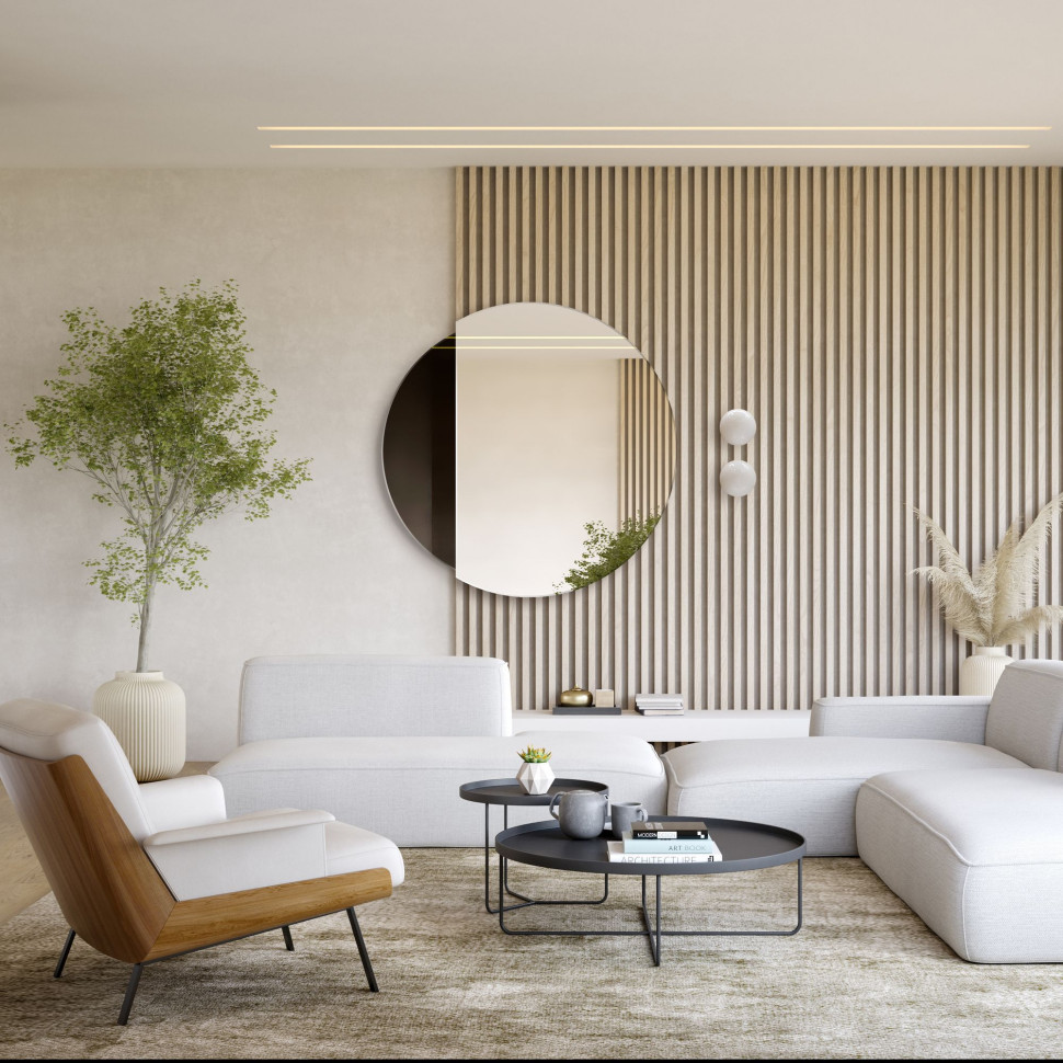 Lustro Eclipse na ścianie za kanapą w nowoczesnym salonie. Fot. GieraDesign