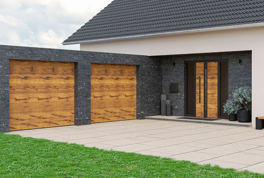 Segmentowa brama garażowa LPU 42 z profilem ThermoFrame będzie skutecznym strażnikiem ciepła w większości domów jednorodzinnych