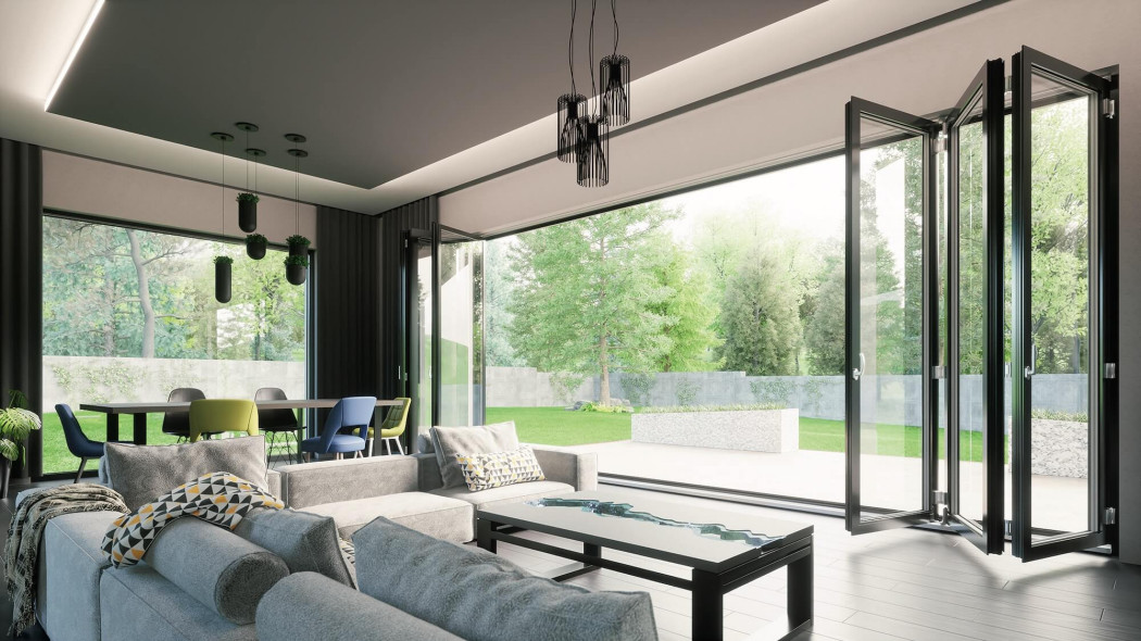 Duże okna w salonie wyglądają obłędnie. Latem mogą zmienić dom w szklarnię